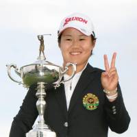 Nasa Hataoka celebrates after winning the Japan Women\'s Open title for the second straight year on Sunday. | KYODO