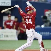 The Eagles\' Yuichi Adachi whacks a two-run triple in the sixth inning against the Buffaloes on Saturday at Kyocera Dome. Tohoku Rakuten routed Orix 7-0. | KYODO