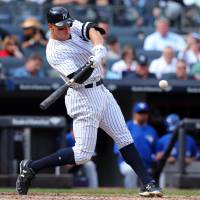 Yankees slugger Aaron Judge belted 52 homers this season, a record for MLB rookies. | USA TODAY / VIA REUTERS