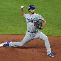 Los Angeles starter Yu Darvish pitches against Houston in the first inning of Game 3 of the World Series on Friday night.  Troy Taormina /USA TODAY / VIA REUTERS | USA TODAY / VIA REUTERS