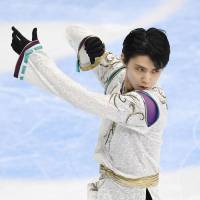 Yuzuru Hanyu skates his free program at the Cup of Russia on Saturday in Moscow. Hanyu finished second overall in the two-day program with 290.77 points. | KYODO