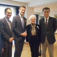 Hungarian Ambassador Nobert Palanovics (second from left) joins guests during a reception to celebrate Hungary\'s national day at the embassy in Tokyo on Oct. 20. | EDLEEN OTHMAN