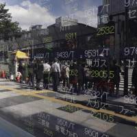 Some companies are buying back their own shares, as part of a strategy to make them less of a target in a more demanding investment environment. | BLOOMBERG