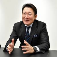 Tomoyasu Kato, CEO of Kato Pleasure Group, speaks during a recent interview at his company\'s headquarters in Tokyo. | YOSHIAKI MIURA