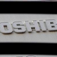 The Toshiba Corp. logo is seen outside an electronics retailer in Tokyo in January. | REUTERS