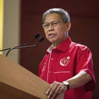 The troubled Trans-Pacific Partnership free trade pact could be salvaged by suspending parts of the deal in order to get the 11 remaining nations to sign on, according to Mustapa Mohamed, Malaysia\'s trade minister. | BLOOMBERG