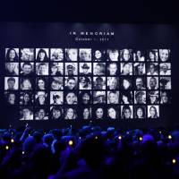 Images of those killed in the Oct. 1 mass shooting in Las Vegas are shown during the in memoriam segment of the 51st Country Music Association Awards show. | REUTERS
