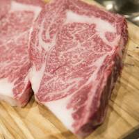 Wagyu beef steaks are seen on a platter at a restaurant in Tokyo. | BLOOMBERG