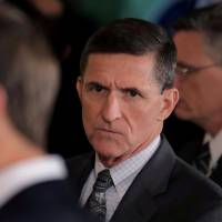 Then-White House national security adviser Michael Flynn arrives prior to a joint news conference between Canadian Prime Minister Justin Trudeau and U.S. President Donald Trump in Washington in February. | REUTERS