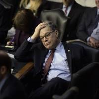 U.S. Sena. Al Franken takes a break during the Neil Gorsuch Senate Judiciary Committee confirmation hearing for U.S. President Donald Trump\'s nominee for the Supreme Court on Capitol Hill in Washington in March. | AFP-JIJI