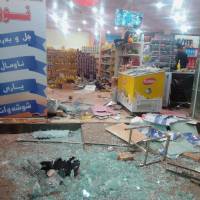 A damaged storefront is seen after an earthquake in Halabja, Iraq, Sunday. | OSAMA GOLPY / RUDAW / SOCIAL MEDIA / VIA REUTERS