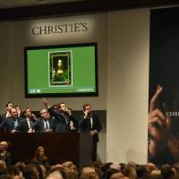 A 500-year-old work of art depicting Jesus Christ, believed to be the work of Renaissance master Leonardo da Vinci, sold in New York on Wednesday for $450.3 million setting a new art auction record, Christie\'s said. \"Salvator Mundi,\" which the auction house dates back to around 1500, sold after 18 minutes of frenzied bidding in a historic sale, the star lot of the November art season in the US financial capital. | AFP PHOTO / TIMOTHY A. CLARY