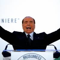 Forza Italia party leader Silvio Berlusconi speaks during a rally in Catania, Italy, on Nov. 2. | REUTERS