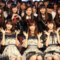 Members of the AKB48 pop group pose for photos with fans in Taiwan earlier this month. The final audition to be part of MNL48, AKB\'s Philippine sister group, will be held in Manila early next month. | CENTRAL NEWS AGENCY / VIA KYODO