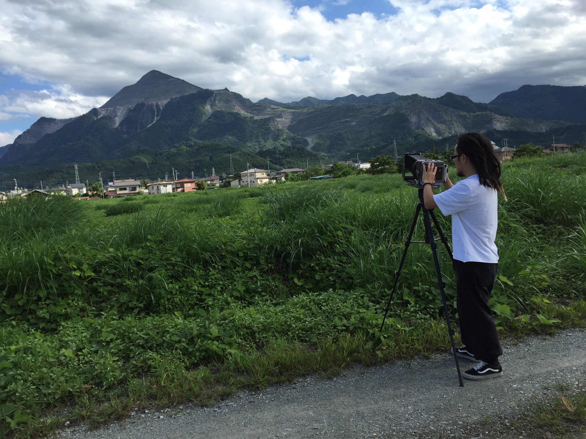 Guitarist Shin Sasakubo photographs Mount Buko in Chichibu, Saitama Prefecture. The mountain, considered a sacred symbol of the region, is being mined by cement companies for its limestone. | COURTESY OF SHIN SASAKUBO