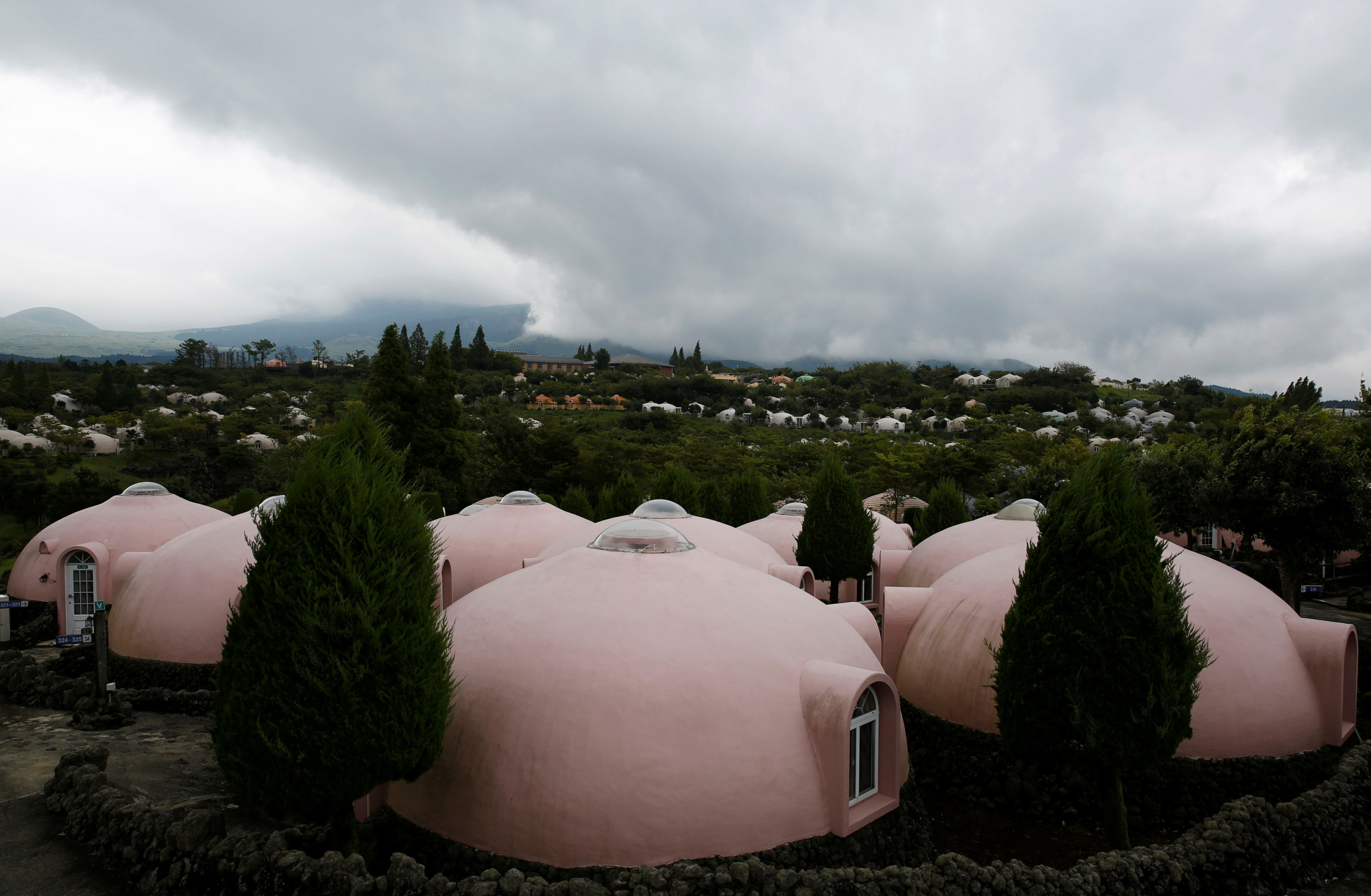 Quake-resistant domed houses made of polystyrene in Aso, Kumamoto Prefecture, are drawing visitors from Asia. | REUTERS