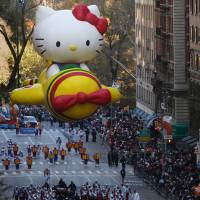 The Hello Kitty balloon appears in this year\'s Thanksgiving Day Parade in New York on Nov. 23. | REUTERS