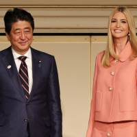 Prime Minister Shinzo Abe and Ivanka Trump attend a meeting of the World Assembly for Women in Tokyo on Friday. | AFP-JIJI