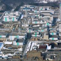 A spent nuclear fuel reprocessing plant in Aomori Prefecture is seen in this aerial photo taken in March 2014. KYODO | TEXAS DEPARTMENT OF PUBLIC SAFETY / VIA AP, FILE