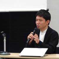 Keiichiro Sako, president of the World Association of Overseas Japanese Entrepreneurs, speaks during a news conference Thursday in Tokyo. | KAZUAKI NAGATA