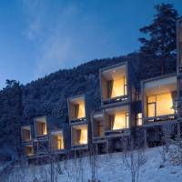 The windows of the Hoshinoya Fuji hotel in Yamanashi Prefecture look out onto Mount Fuji | HOSHINO RESORTS