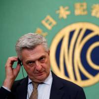 U.N. High Commissioner for Refugees Filippo Grandi attends a news conference at the Japan National Press Club in Tokyo on Monday. | REUTERS