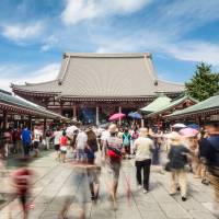 Visitors are seen at the famous Sensoji Buddhist temple in Tokyo\'s historic Asakusa district. | ISTOCK