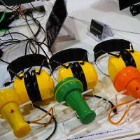 A device that transmits sound through vibration to help deaf people is displayed at Super Welfare Expo on Nov. 10 in Tokyo. | MAGDALENA OSUMI