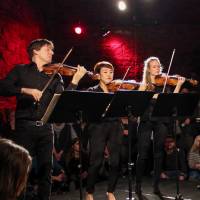 Modern strings: A Klassik Underground event in Germany featured Tahlia Petrosian (far right) and a string section play in an intimate setting. | AFP-JIJI