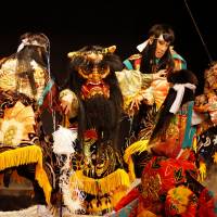 Monster mash: Members of the Yachiyo Kagura Troupe perform in a scene depicting  a fight between some warriors and an ogre during a performance  in Yachiyo Town, Akitakata, Hiroshima. | COURTESY OF AKITAKATA, HIROSHIMA PREFECTURE