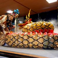 Dragon dance: A deity confronts a dragon during a kagura performance at Waseda Shrine in Hiroshima Prefecture. | ANGELES MARIN CABELLO