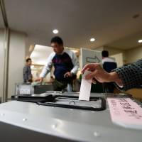 Blind vote: On Oct. 22, citizens decided that the seven most recent  appointees to Japan\'s  Supreme Court would keep their jobs. | BLOOMBERG