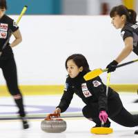 The Japanese team, LS Kitami, competes at the Pacific-Asia Curling Championships on Wednesday in Erina, Australia. | KYODO