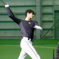 Shohei Otani works out at the Hokkaido Nippon Ham Fighters\' minor league complex in Kamagaya, Chiba Pref., on Sunday. | KYODO