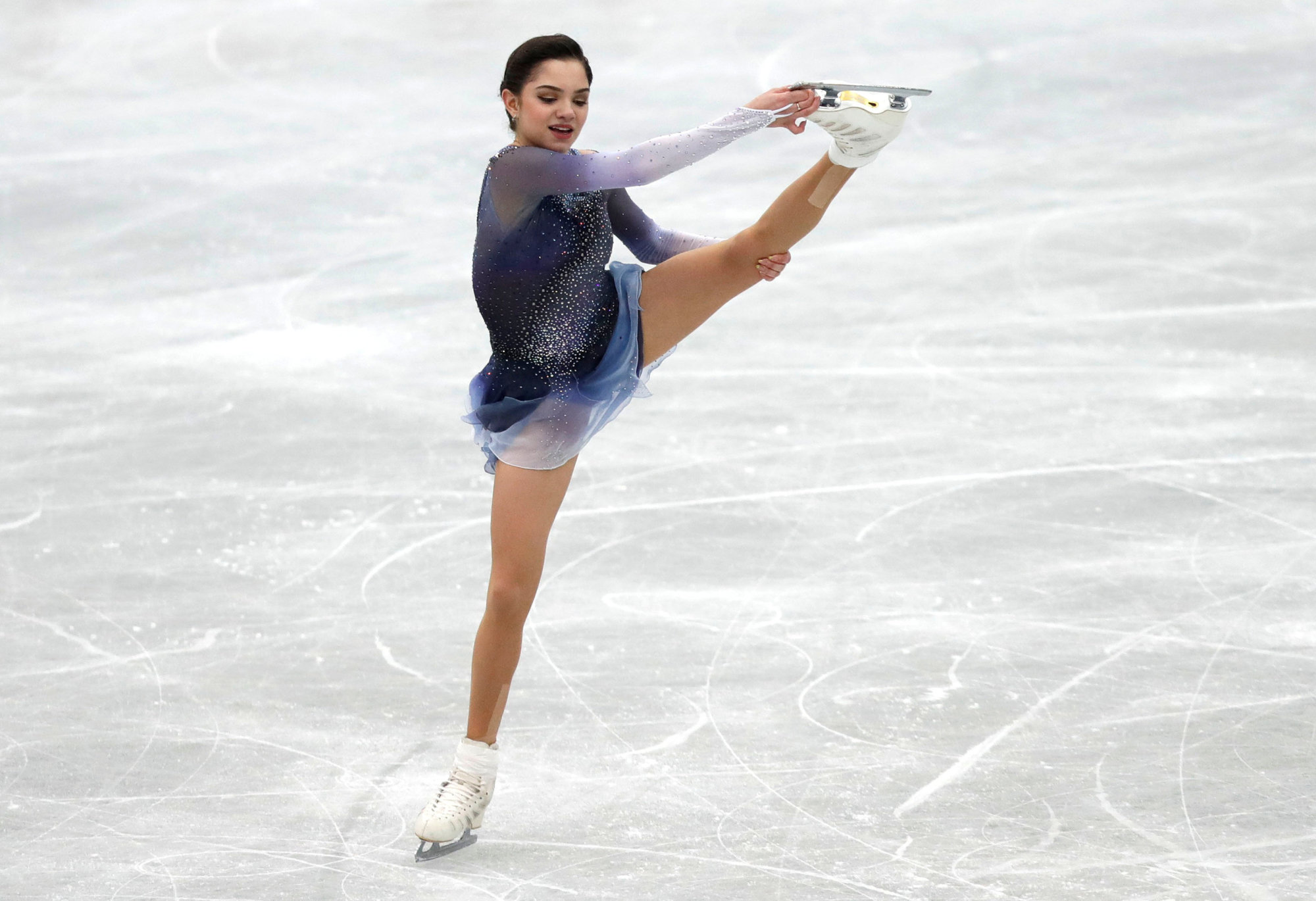 Russia's Evgenia Medvedeva skates in the short program at the NHK Trophy on Friday at Osaka Municipal Central Gymnasium. Medvedeva leads the field with 79.99 points. | REUTERS