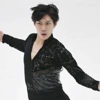 Keiji Tanaka performs his short program at the Cup of China on Friday. He is fourth with 87.19 points heading into Saturday\'s free skate. | KYODO