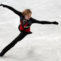 Sergei Voronov skates in the men\'s short program at the NHK Trophy on Friday night. Voronov leads the field with 90.06 points. | REUTERS
