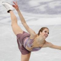Italy\'s Carolina Kostner competes in the women\'s free skate on Saturday at the NHK Trophy. Kostner earned the runner-up spot with 212.24 points. | REUTERS