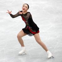 Rika Hongo, who finished in seventh place, performs her free skate on Saturday. | REUTERS