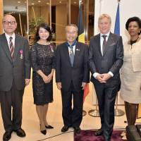 Belgian Ambassador Gunther Sleeuwagen (second from right) and his wife, Rahel (right), pose for a photo with (from left) officer of the order of Leopold recipients Jiro Okuyama and Misuzu Iwami, who are both vice-grand master of ceremonies at the Imperial Household Agency,  and commander of the order of Leopold II recipient Yuki Mayor Fumio Zemba during a reception to celebrate King\'s Day on Nov. 17. | YOSHIAKI MIURA