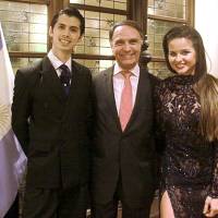 Argentine Ambassador Alan Beraud (center) poses with Tango World Champions Axel Arakaki (left) and Agostina Tarchini at the Argentinian Embassy on Nov. 1. | COURTESY OF THE ARGENTINIAN EMBASSY