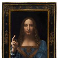 Leonardo da Vinci\'s \"Salvator Mundi,\" the last privately owned Leonardo, was put on auction by Christie\'s in New York on Wednesday, and after 19 minutes of frenzied bidding (top right), the auctioneer (lower right) declared it sold for a record &#36;450 million, including a &#36;50 million fee. The sum by far topped the previous record of &#36;300 million for Willem de Kooning\'s \"Interchange\" in 2015. The buyer is unknown. | REUTERS
