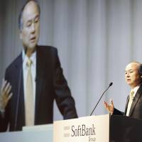 SoftBank Group Corp. Chief Executive Officer Masayoshi Son attends an earnings release at a Tokyo hotel in May. | KYODO