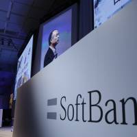 SoftBank Group Corp. Chief Executive Officer Masayoshi Son speaks during a SoftBank World presentation at a hotel in Tokyo in July. A group led by Softbank has acquired a major stake in Uber. In a tender offer that expired Thursday, SoftBank acquired a 15 percent stake in Uber while the remaining members got about 3 percent, according to a person familiar with the situation who was not authorized to discuss details. | AP