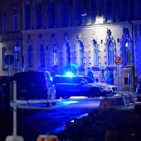 Police are seen at the site of an attack near a synagogue in Gothenburg, Sweden, Saturday. | TT NEWS AGENCY / ADAM IHSE / VIA REUTERS