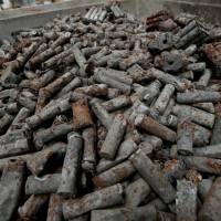 Pyrolized Lithium ion accus of laptops, smartphones and accu-powered craftsmen tools are pictured at the German recycling firm Accurec in Krefeld, Germany, Nov.16. | REUTERS