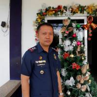 Police Superintendent Lito Patay, regional chief of the Criminal and Investigation Detection Group (CIDG), poses outside his office at Camp Olivas police camp in San Fernando, Pampanga in the Philippines Dec. 11. | REUTERS