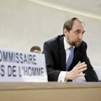 Jordan\'s Zeid Ra\'ad al Hussein, U.N. High Commissioner for Human Rights, speaks with a delegate prior to the 27th special session of the Human Rights Council on \"the human rights situation of the minority Rohingya Muslim population and other minorities in the Rakhine state of Myanmar\" at the European headquarters of the United Nations in Geneva on Tuesday. | KEYSTONE / VIA AP