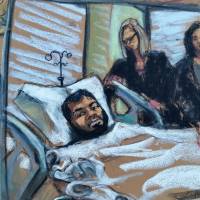 Akayed Ullah, a 27-year-old supporter of the Islamic State militant group, is seen in this courtroom sketch appearing by video for a hearing from his bed in Bellevue Hospital in New York Wednesday. | JANE ROSENBERG / VIA REUTERS