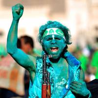 A Yemeni attends a rally in Sanaa for the Prophet Mohammed\'s birthday on Thursday. | AFP-JIJI